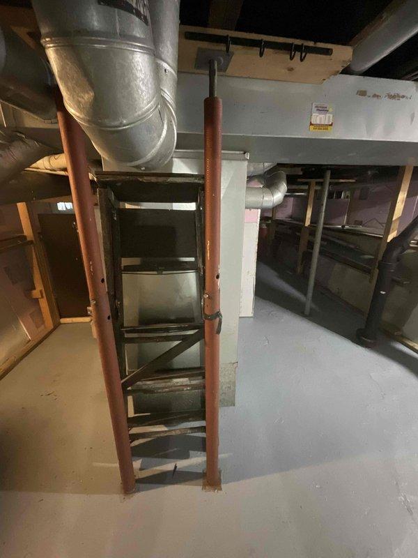 Conducted comprehensive site evaluation for complete HVAC system replacement at residential property. Assessed existing outdoor condensing unit located on brick paver patio against exterior wall and evaluated basement mechanical room with existing ductwork infrastructure. Documented current equipment conditions, measured installation clearances, reviewed electrical service accessibility, and provided detailed replacement options with equipment specifications suitable for the home's heating and cooling requirements.