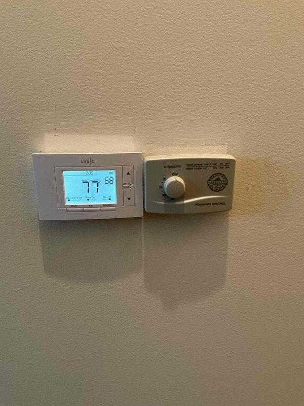 Completed comprehensive fall tune-up and maintenance on 2-year-old Lennox furnace system in preparation for heating season. System was operational upon arrival with Emerson digital thermostat reading 77°F with setpoint at 58°F and separate humidistat control functioning properly. Performed full inspection of furnace components including blower motor assembly, fan wheel, electrical connections, control boards, and wiring harness. Verified all safety labels and manufacturer specifications were intact and legible. System tested and confirmed to be operating within normal parameters and ready for winter heating demands.