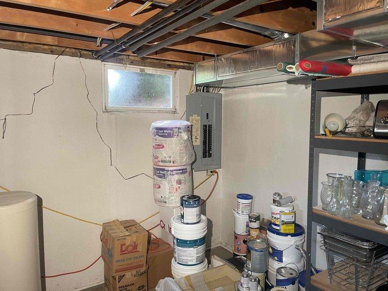 Conducted on-site assessment for Kohler whole home generator installation at residential property. Evaluated existing electrical panel location in basement utility area and confirmed adequate space for generator equipment and necessary electrical connections. Documented current electrical infrastructure to determine installation requirements and compatibility for whole home backup power system.