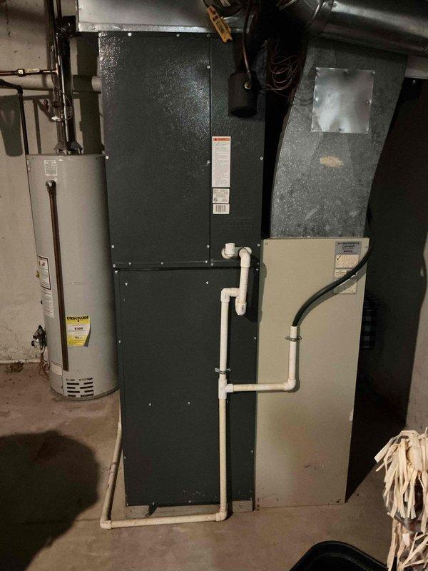 Responded to service call for Goodman A/C condenser unit producing clicking noises. Upon inspection, diagnosed faulty contactor relay in approximately 9-year-old outdoor condensing unit. Replaced defective contactor, verified proper electrical connections, and tested system operation through complete cooling cycle. Unit now operating quietly with normal startup and shutdown sequences, proper amp draw, and no abnormal sounds detected.