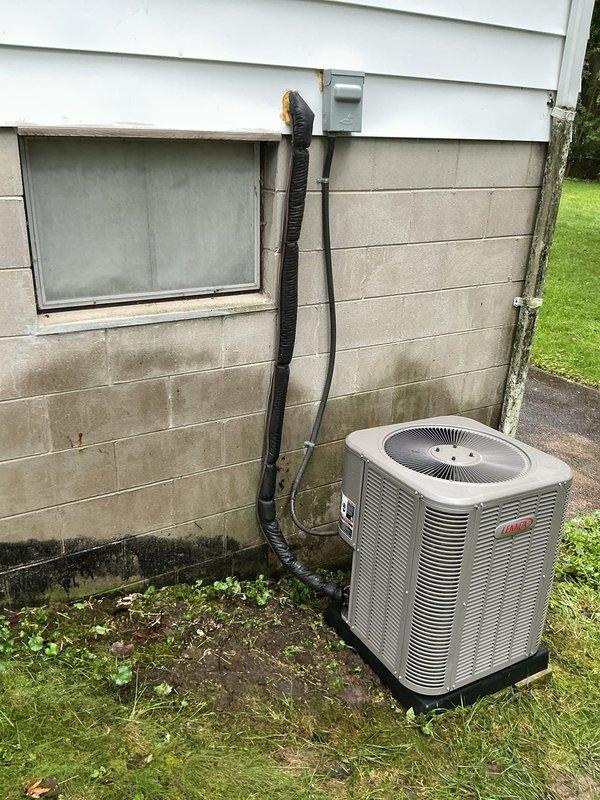Responded to no-cooling call on 6-year-old Bryant system with basement air handler and outdoor condensing unit. Upon arrival, confirmed system was not operating. Homeowner had previously attempted troubleshooting including thermostat reset, breaker verification, condensate line clearing, and filter replacement without success. Performed diagnostic evaluation of electrical components, refrigerant lines, and condensing unit operation. Identified and resolved issue preventing system startup. Restored cooling operation and verified proper system function. Addressed homeowner questions regarding upstairs temperature differential and explained that while airflow diverters or dampers can help balance multi-level homes, a comprehensive assessment of ductwork design and airflow would be needed to determine optimal solution. Explained function of air handler compartment access panel and proper operation. System tested and left in operational condition with cooling restored throughout home.
