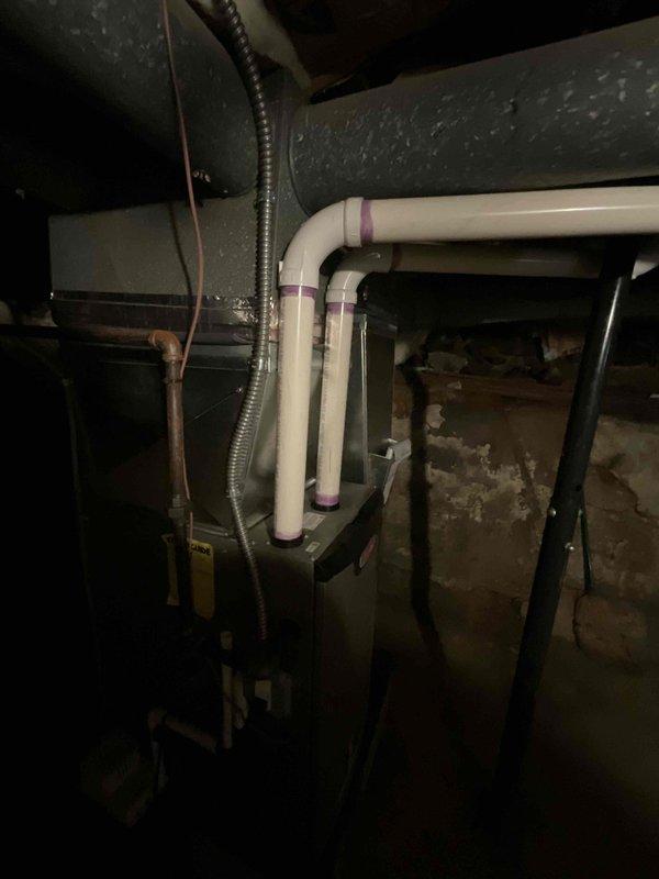 Conducted comprehensive site evaluation for complete HVAC system replacement at residential property. Current air conditioning unit non-operational and existing heating and cooling equipment requires full replacement due to age and condition. Assessed basement installation location including existing furnace with natural gas fuel source, ductwork configuration, electrical panel capacity, and condensate drainage system. Documented existing equipment specifications, reviewed available electrical service for new system requirements, and evaluated ductwork connections and space constraints for proposed equipment installation. Provided estimate for replacement of both heating and cooling systems to restore climate control functionality.