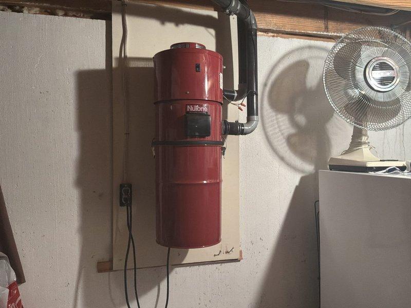 Conducted on-site evaluation for whole-house Kohler generator installation at residential single-family home. Assessed existing electrical service panel location in basement utility area and documented gas meter configuration on exterior wall to determine optimal generator placement and required electrical connections. Photographed current electrical infrastructure and gas service equipment to develop comprehensive installation estimate including transfer switch placement, load calculations, and utility coordination requirements.