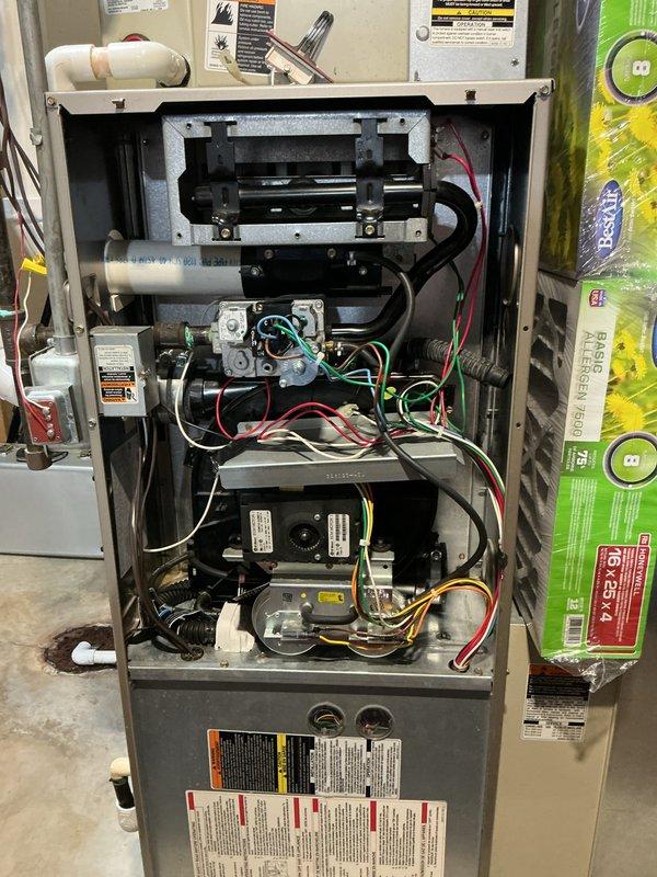 Completed annual HVAC maintenance on residential furnace unit. Performed comprehensive inspection of all internal components including blower motor assembly, gas valve connections, ignition system, and inducer motor. Verified proper operation of all electrical connections and wiring harnesses throughout the unit. Inspected venting and condensate drainage systems. All components found to be in good working condition with no immediate repairs required. Unit operating within normal parameters.