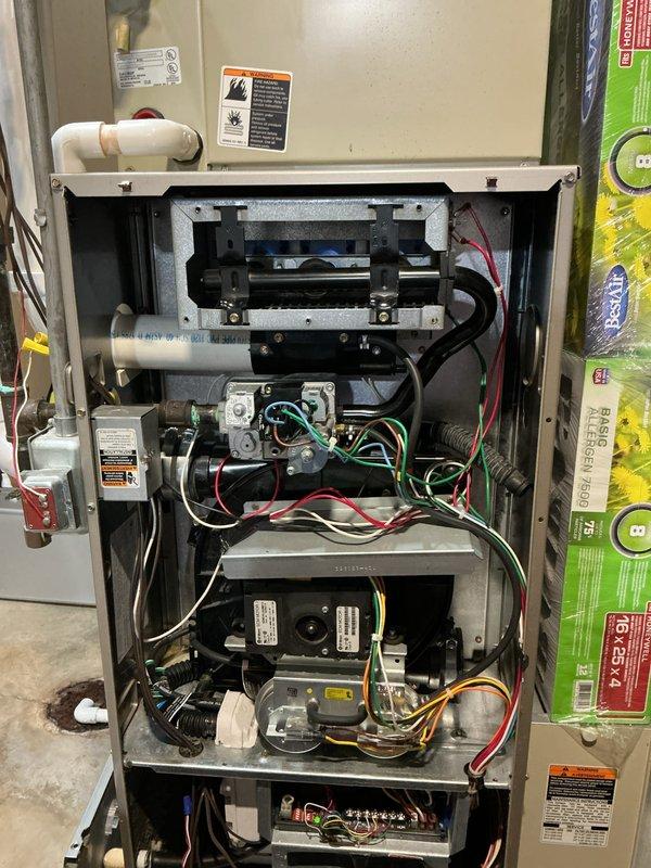 Completed annual HVAC maintenance on residential furnace unit. Performed comprehensive inspection of all internal components including blower motor assembly, gas valve connections, ignition system, and inducer motor. Verified proper operation of all electrical connections and wiring harnesses throughout the unit. Inspected venting and condensate drainage systems. All components found to be in good working condition with no immediate repairs required. Unit operating within normal parameters.