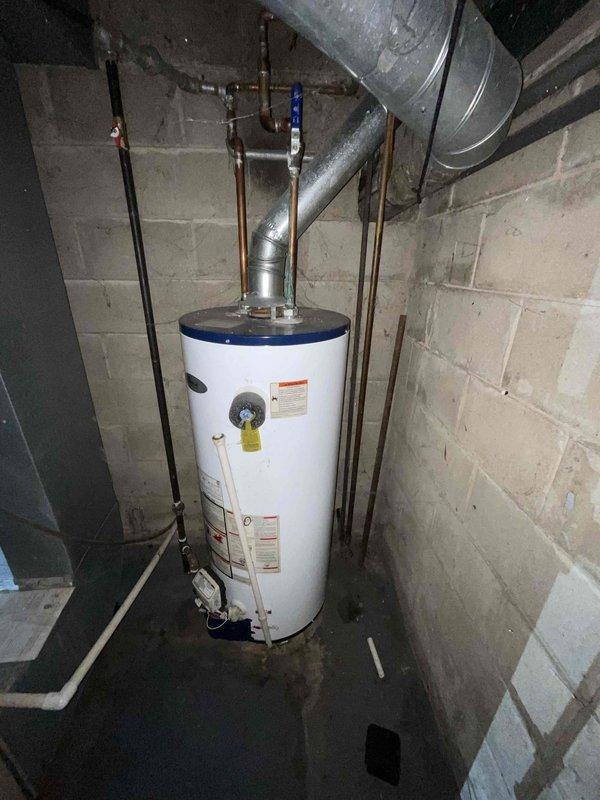 Provided estimate for complete replacement of 40+ year old non-operational furnace and air conditioning system located in basement. Current natural gas furnace and AC unit have exceeded their service life and require full system replacement. Assessment included evaluation of existing ductwork, electrical connections, gas line configuration, and ventilation requirements to determine proper equipment specifications and installation scope for new HVAC system.