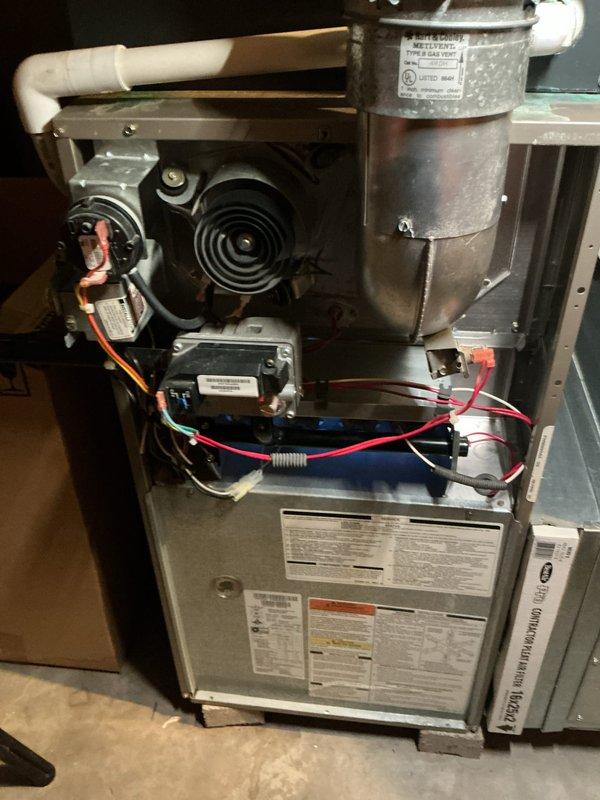 Performed routine maintenance and tune-up on a 21-year-old furnace system. Conducted comprehensive inspection of all internal components including draft inducer motor, burner assembly, gas valve, and blower compartment. Performed electrical testing using digital multimeter to verify proper system operation and component functionality. Cleaned burner assembly and internal components, inspected all wiring connections, and verified proper airflow through the unit. System found to be operating within normal parameters with no deficiencies noted. All safety controls tested and confirmed operational.