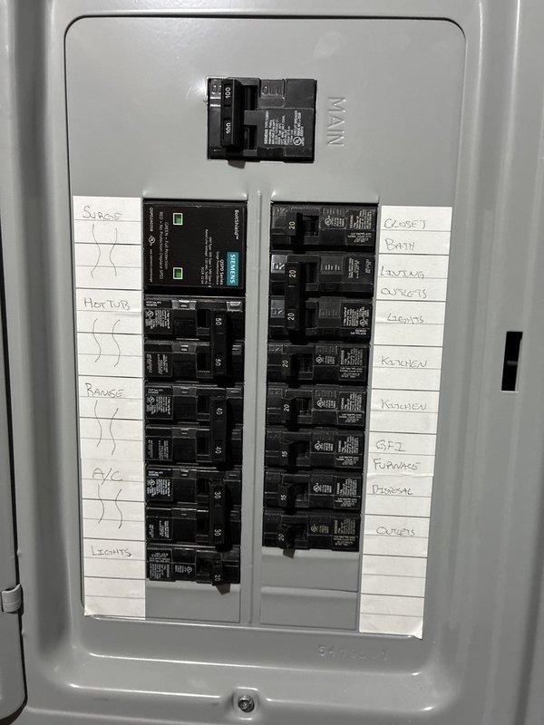 Provided comprehensive estimate for complete HVAC system replacement including 24-year-old furnace located in basement and air conditioning unit positioned outside. Assessed existing electrical panel configuration and circuit capacity to ensure compatibility with new equipment installation, documented current breaker arrangement including dedicated circuits for furnace and AC unit, and evaluated utility space layout for proper equipment placement and clearances.