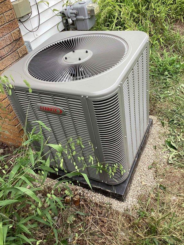 Completed full HVAC system installation including a 70,000 BTU furnace with humidifier and 2.5-ton air conditioning unit with evaporator coil. Installed Lennox outdoor condenser unit on concrete pad with proper drainage and electrical connections, positioned furnace in basement with PVC venting, condensate pump, and integrated humidifier system. Reconnected all ductwork, completed electrical hookups, and obtained mechanical permit for installation.