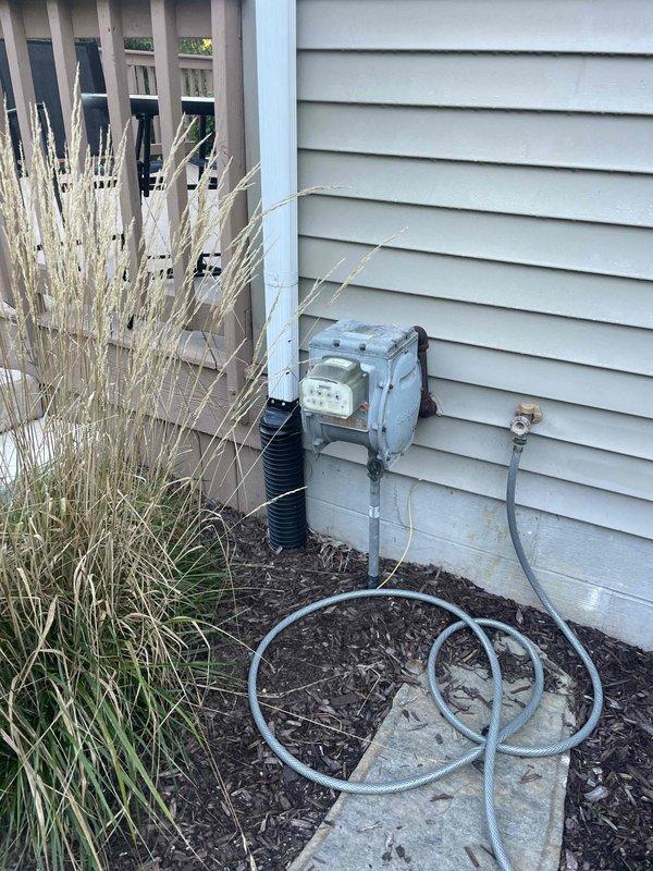 Conducted on-site evaluation for whole house standby generator installation to replace existing portable Honda 5000 unit. Assessed electrical service capacity, reviewed current meter installation and utility connections, evaluated potential generator placement locations in side yard area, and discussed automatic transfer switch requirements. Provided professional recommendations on generator sizing for full home backup power and compared equipment options including Kohler and other manufacturers suitable for automatic operation without manual intervention.