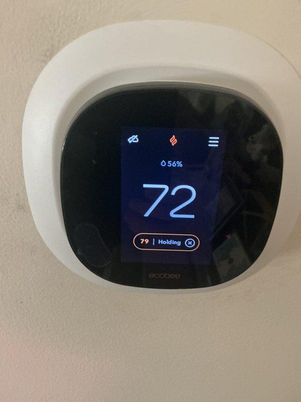 Completed annual maintenance and AC tune-up on 4-year-old Lennox system with warranty coverage through May 2027. Performed comprehensive inspection of furnace components with burners operating properly as evidenced by clean blue flame combustion, replaced air filter, verified ecobee thermostat functionality showing proper temperature hold at 72 degrees, and confirmed all system components are operating within normal parameters with no issues identified.