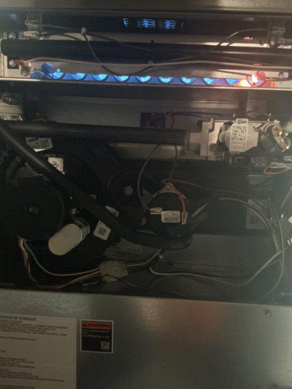 Completed annual maintenance and AC tune-up on 4-year-old Lennox system with warranty coverage through May 2027. Performed comprehensive inspection of furnace components with burners operating properly as evidenced by clean blue flame combustion, replaced air filter, verified ecobee thermostat functionality showing proper temperature hold at 72 degrees, and confirmed all system components are operating within normal parameters with no issues identified.