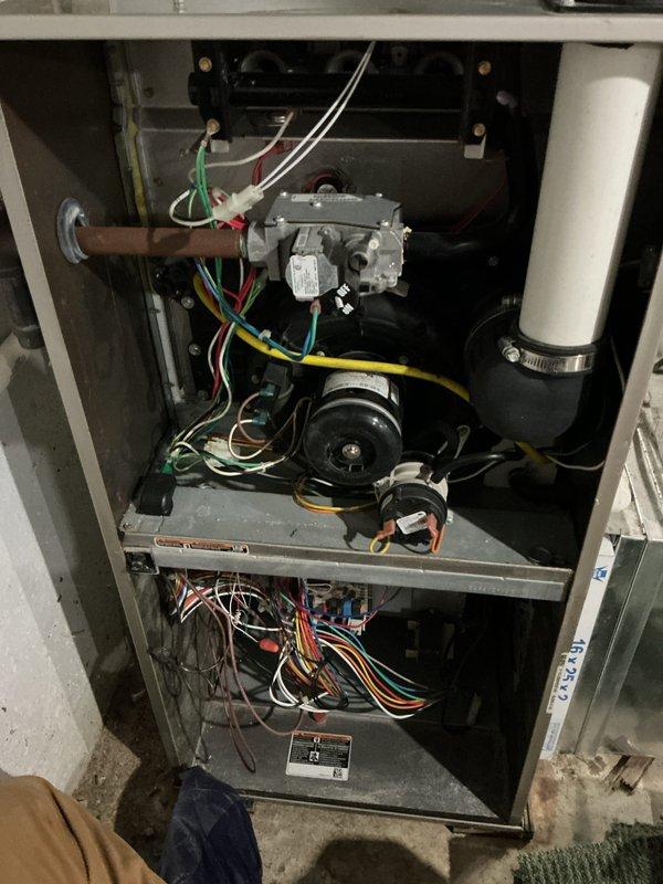 Completed preventive maintenance inspection on residential HVAC system. Verified thermostat operation displaying 75°F in heating mode, inspected furnace components including gas valve assembly, blower motor, and electrical connections, and noted filter may require replacement at next service interval.