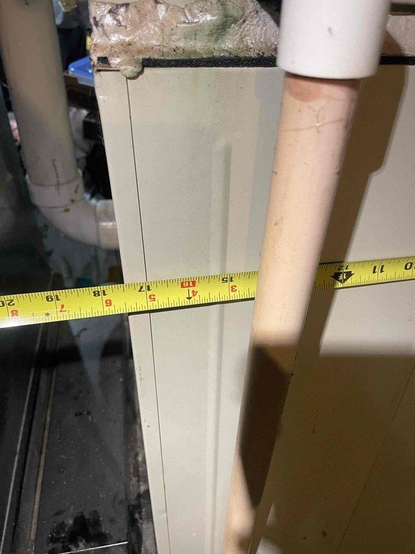 Completed estimate for replacement of non-functioning air conditioning unit, natural gas furnace, and hot water tank located in basement. All existing equipment exceeded 35 years of age and required full system replacement. Assessed existing ductwork, venting infrastructure including PVC drain lines, and copper plumbing connections to determine specifications for new equipment installation.