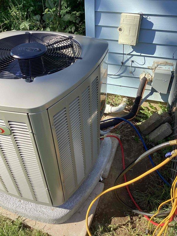 Completed full HVAC system installation including a 70,000 BTU furnace, 2-ton air conditioning unit with matching evaporator coil, and humidifier. Installed new outdoor condenser unit on concrete pad in rear yard with proper electrical disconnect and refrigerant line connections. Mounted furnace in mechanical room with complete ductwork integration and reconnected all necessary utilities. All equipment installed per manufacturer specifications and local mechanical permit requirements, with system tested and operational upon completion.