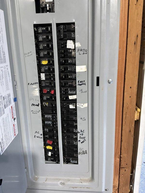 Completed electrical site assessment for new whole home Kohler generator installation. Evaluated existing main electrical panel configuration, circuit breaker layout, and available capacity to determine proper integration point for automatic transfer switch. Documented current electrical infrastructure including main service panel location in garage area, existing circuit distribution, and wire routing pathways to establish generator placement requirements and connection specifications for upcoming installation.