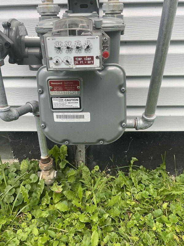 Completed electrical estimate for Kohler whole home generator installation at manufactured home. Assessed existing natural gas meter location and capacity, evaluated electrical panel configuration and circuit breaker layout for generator integration. Documented gas service infrastructure and interior electrical panel specifications to determine equipment requirements and installation feasibility for automatic transfer switch and generator connection.