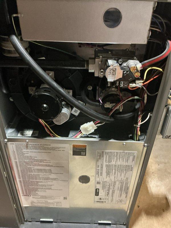 Completed annual heating maintenance on residential forced air furnace system. Performed comprehensive inspection of all internal components including blower motor assembly, gas valve, electrical connections, and control systems. Verified proper operation of ignition system and heat exchanger integrity. Inspected and documented condition of wiring harnesses, flexible ductwork connections, and safety controls. All manufacturer labels and specifications verified as legible and intact. System tested and confirmed operational within normal parameters. Unit left in safe and proper working condition for the heating season.