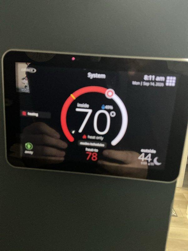 Completed comprehensive ComfortShield Maintenance Package including system inspection, filter replacement with MERV 11 HCF20-11 media filter, and thermostat functionality verification. Confirmed heating system operational status with proper temperature differential between indoor setpoint of 70°F and ambient conditions, and documented smart thermostat display showing correct system communication and control functions.