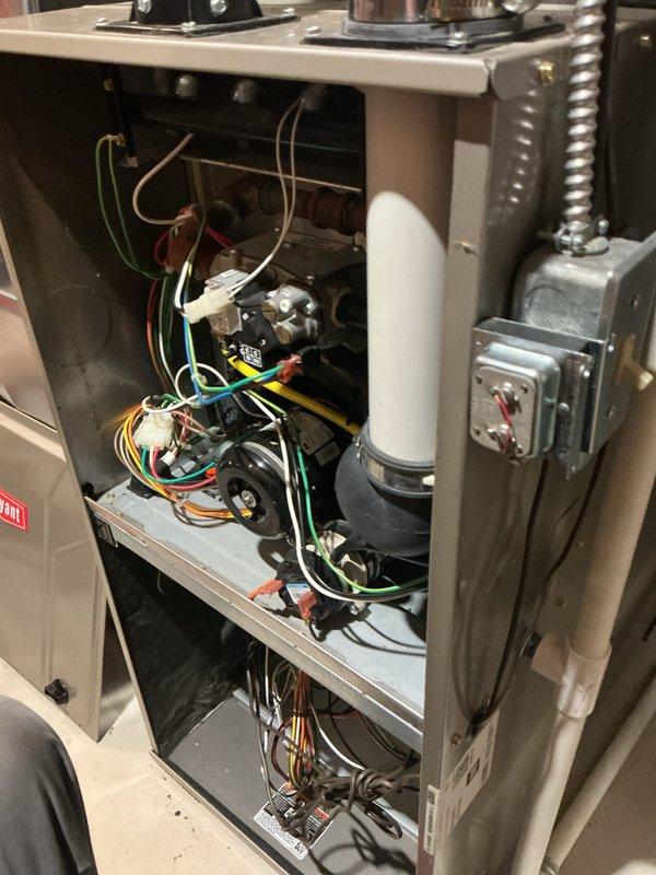 Completed comprehensive heating system maintenance as part of Air Care membership service. Performed full furnace tune-up including inspection of blower motor assembly, electrical connections, capacitor, control board, and all internal mechanical components. All wiring harnesses, relays, and electrical connections verified secure and functioning properly with no issues identified during inspection.