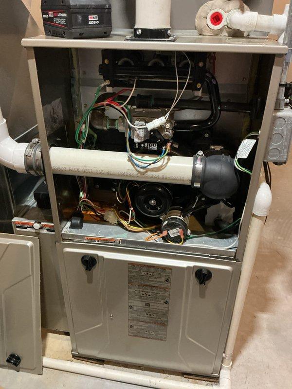 Completed scheduled AHM maintenance on residential furnace unit, including filter replacement and evaporative cooler pad service. Unit was inspected with burner assembly operational and all electrical connections verified; system tested and confirmed functioning properly upon completion.