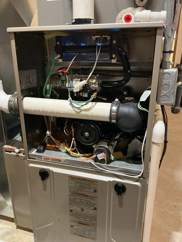 Completed scheduled AHM maintenance on residential furnace unit, including filter replacement and evaporative cooler pad service. Unit was inspected with burner assembly operational and all electrical connections verified; system tested and confirmed functioning properly upon completion.