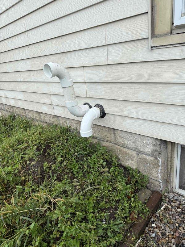 Completed installation of 70,000 BTU furnace in basement utility area with proper reconnection to existing ductwork system. Installed white PVC venting through exterior wall with appropriate termination and support. Obtained mechanical permit prior to installation and verified all connections meet code requirements for safe operation.