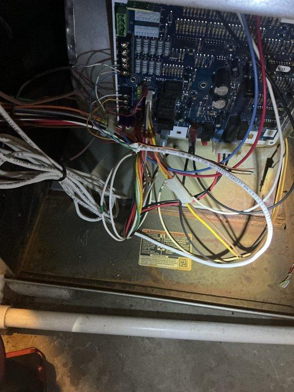 # Annual HVAC Maintenance Completed

Performed comprehensive annual cooling maintenance on residential air conditioning system as part of preventative maintenance program. Conducted thorough inspection of outdoor condensing unit and indoor air handler components to ensure optimal system performance for the upcoming cooling season.

Inspected gas furnace burner assembly and verified proper ignition sequence with clean blue flame pattern across all burners. Examined heat exchanger for signs of corrosion or cracking. Evaluated furnace control board and electrical connections, confirming all wire terminations were secure and properly seated in connector blocks. Verified all safety switches and limit controls were functioning correctly.

Checked condensate drain system including drain pan, trap, and discharge lines for proper drainage and blockages. Inspected blower motor assembly and verified proper operation. Examined all visible wiring harnesses for signs of wear, overheating, or loose c
