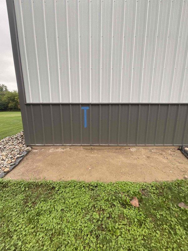 Conducted on-site estimate for new hanging heater installation in pole barn structure with metal corrugated siding and finished interior workspace. Assessed installation requirements for space currently housing recreational vehicles and equipment, including proper clearances, venting needs, and optimal mounting location on metal wall assembly. Documented site conditions and building specifications through photographs to determine appropriate unit sizing and installation approach for this new construction heating application.
