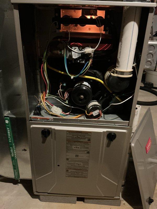 Completed annual preventative maintenance on Bryant residential HVAC system including both heating and cooling components. Performed comprehensive inspection of furnace unit, verified heat exchanger integrity and burner operation, checked blower motor function and electrical connections, inspected PVC venting system for proper drainage and exhaust flow, and replaced air filters. Tested system operation under heating mode with visible ignition sequence, confirmed all safety controls functioning properly, and verified proper airflow throughout the system. Unit operating within manufacturer specifications with no issues identified.