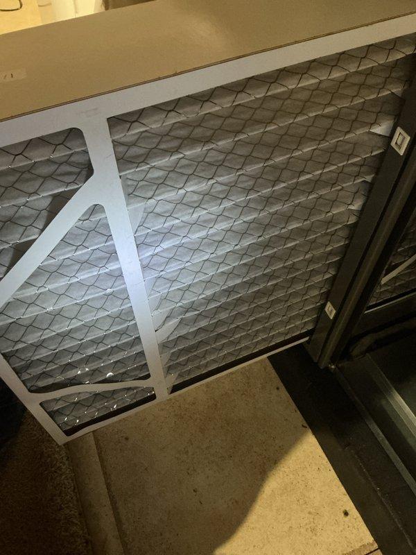 Completed routine cooling maintenance and AC tune-up as part of Air Care membership with no issues reported. Performed comprehensive system inspection of outdoor air conditioning unit, verified proper operation of all components, and checked refrigerant levels. Inspected indoor air filter showing good condition with clean pleated media in place, and confirmed Lennox digital thermostat displaying proper temperature readings at 73°F with humidity level at 65%, though noted Wi-Fi connectivity issue on display.