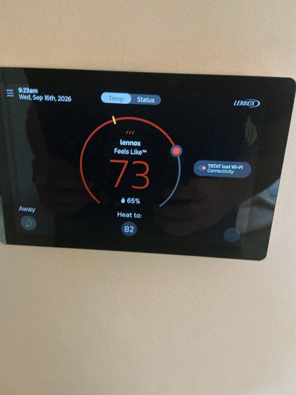 Completed routine cooling maintenance and AC tune-up as part of Air Care membership with no issues reported. Performed comprehensive system inspection of outdoor air conditioning unit, verified proper operation of all components, and checked refrigerant levels. Inspected indoor air filter showing good condition with clean pleated media in place, and confirmed Lennox digital thermostat displaying proper temperature readings at 73°F with humidity level at 65%, though noted Wi-Fi connectivity issue on display.