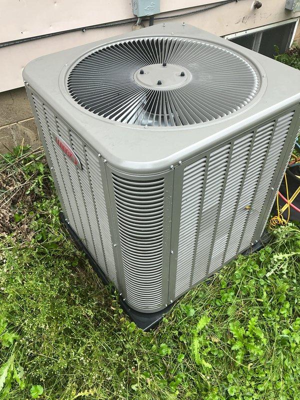 Completed comprehensive AC tune-up on Lennox outdoor condenser unit as part of Air Care membership preventive maintenance. Performed full system inspection, cleaned condenser coils, checked refrigerant levels, tested electrical connections, and verified proper airflow through louvers and fan assembly. Noted significant vegetation growth around unit base and recommended improved clearance for optimal efficiency, though system is operating within normal parameters with no immediate issues requiring repair.