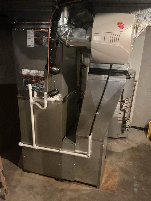 Completed scheduled Air Handler Maintenance (AHM) on residential HVAC system. Performed comprehensive inspection of furnace/air handler unit, ductwork connections, and condensate drain lines. Verified thermostat operation on both digital and analog units, confirmed proper temperature readings and system communication. All components found operating within normal parameters with no deficiencies noted.