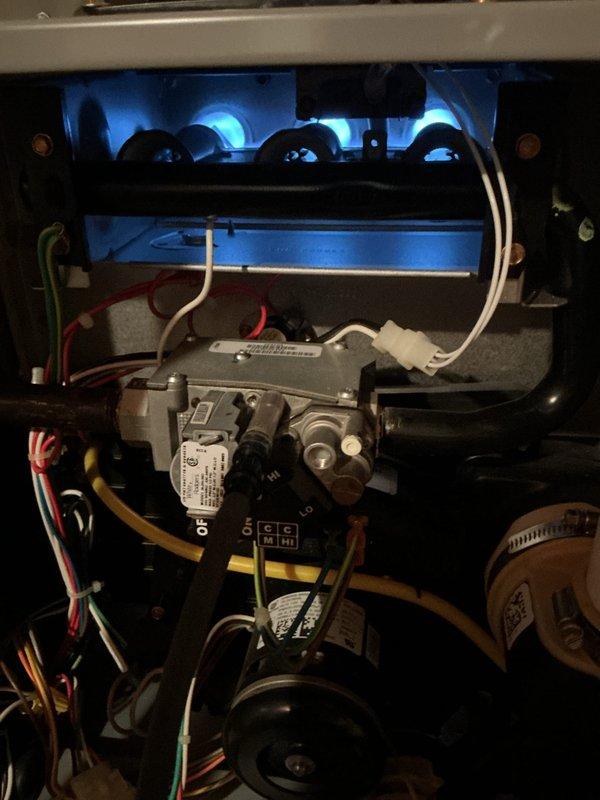 Completed annual HVAC maintenance inspection on gas furnace system. Performed comprehensive evaluation of burner assembly, gas valve, electrical connections, and blower motor components. Verified proper ignition with blue flame pattern across all burner ports, inspected gas valve controls and associated wiring harnesses, and confirmed all mechanical and electrical components operating within normal parameters. System tested and left in proper working condition.