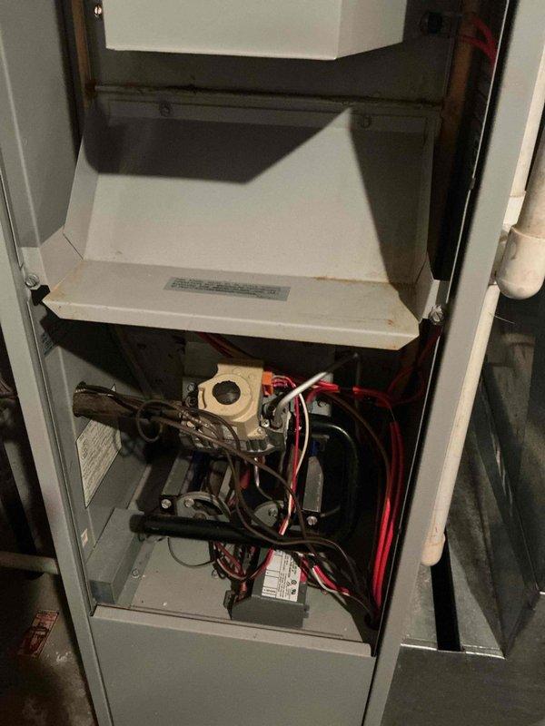 Completed annual HVAC maintenance inspection on residential furnace system. Performed comprehensive inspection of all internal components including blower motor assembly, electrical connections, wiring harnesses, control board, heat exchanger, and ductwork connections. Verified proper operation of all mechanical and electrical systems, checked duct connections and seals, and documented equipment condition through photographic documentation for maintenance records.