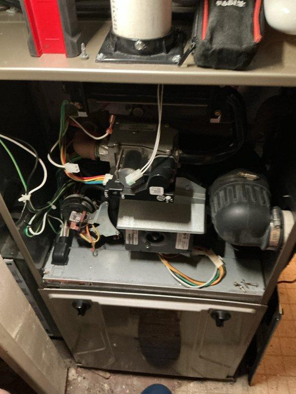Completed annual maintenance on two air conditioning systems: a 30-year-old Amana unit and a 1-year-old Lennox unit, along with a 1-year-old forced air furnace. Performed comprehensive tune-up procedures including inspection of electrical connections, testing of compressor operation, verification of refrigerant lines, and examination of internal components and wiring on both AC systems. All equipment found to be operating within normal parameters with no issues identified during inspection.