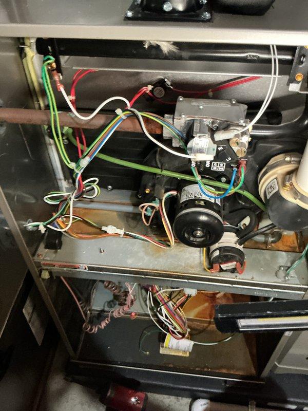 Completed annual heating maintenance on two HVAC systems. Performed comprehensive inspections of both units, including blower motor assemblies, electrical connections, and control modules. Replaced two humidifier pads and two furnace filters as scheduled. Verified proper electrical connections and wire management throughout mechanical compartments. Conducted temperature readings using calibrated instruments, recording supply air temperature of 45.1°F during system diagnostics. All components inspected and found to be operating within normal parameters. Systems tested and left in proper working condition for the heating season.