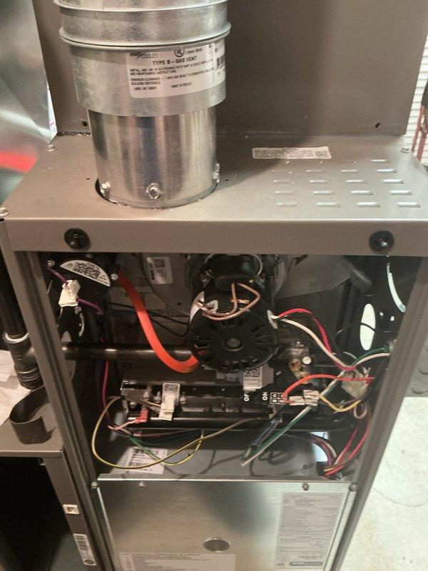 Completed comprehensive fall furnace tune-up on three-year-old unit with no reported issues. Performed full system inspection including internal components, motors, electrical connections, and wiring verification. Inspected and documented air filter condition showing normal dust accumulation; filter examined for proper fit and airflow capacity. Verified draft inducer motor operation, checked all wire connections and terminal blocks for secure contact, and confirmed proper mounting of all mechanical components. All systems operating within normal parameters with no deficiencies noted.