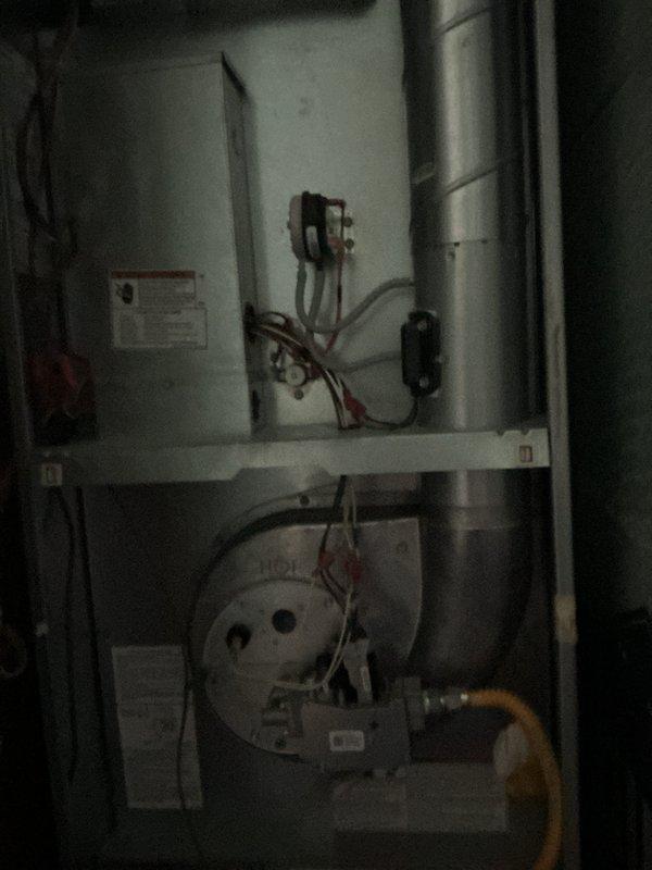Performed comprehensive furnace inspection and blower motor replacement on 6-year-old Coleman forced air furnace, model DGAX056BDTA. Removed existing blower motor assembly from lower compartment, disconnected electrical connections and mounting hardware, and installed new blower motor with proper mounting brackets. Verified all electrical connections including control board wiring, tested blower operation across all speed settings, and confirmed proper airflow through ductwork. Inspected upper compartment control board, relay connections, and associated wiring for any signs of wear or damage. All components functioning within manufacturer specifications upon completion.