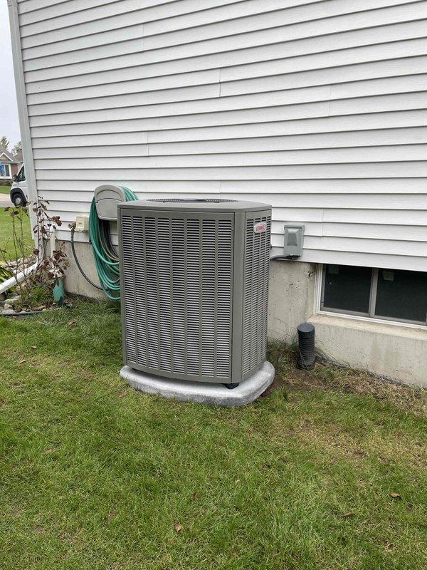 Completed full HVAC system installation including a 70,000 BTU furnace, 3-ton air conditioning unit with matching evaporator coil, and humidifier. The outdoor condensing unit was positioned on a concrete pad in the right side yard with proper electrical disconnect and conduit installation. Inside the mechanical room, installed the new furnace on the concrete floor with all required PVC venting routed through existing ductwork pathways, connected supply and return ductwork using proper transitions and flexible connectors, and integrated the humidifier into the system. Reconnected all electrical components, tested system operation to verify proper heating and cooling functionality, and ensured all connections met code requirements per mechanical permit specifications.