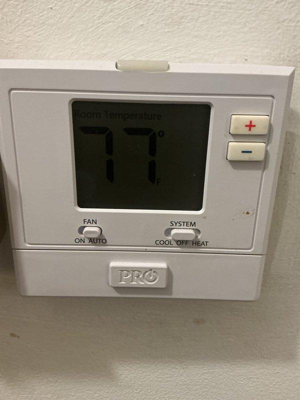 Completed annual HVAC maintenance inspection on air handling system. Performed comprehensive system evaluation including control board inspection, verified thermostat operation and temperature readings at 77°F, checked electrical connections and wiring integrity throughout the unit, and inspected blower housing assembly. All components found operating within normal parameters with no immediate service needs identified.