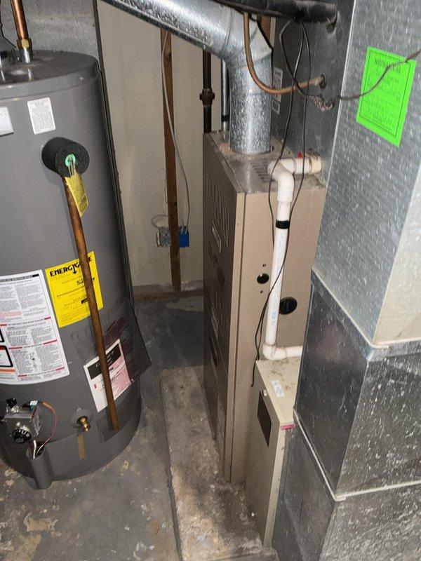 Completed full system estimate for residential HVAC replacement in basement mechanical room. Evaluated existing 16-year-old furnace and associated components including ductwork, refrigerant lines, and water heater configuration. Documented current system layout with photographic evidence showing equipment arrangement, venting, electrical connections, and copper piping. Provided replacement recommendations for aging equipment with customer seeking installation within current season.