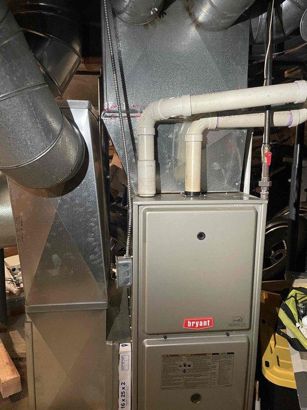 Completed comprehensive estimate for full HVAC system replacement including new air conditioning unit and furnace installation. Assessed existing Bryant furnace setup in basement mechanical room, evaluated ductwork configuration, condensate drainage system, and clearance measurements in attic space to determine equipment specifications and installation requirements for complete system upgrade.