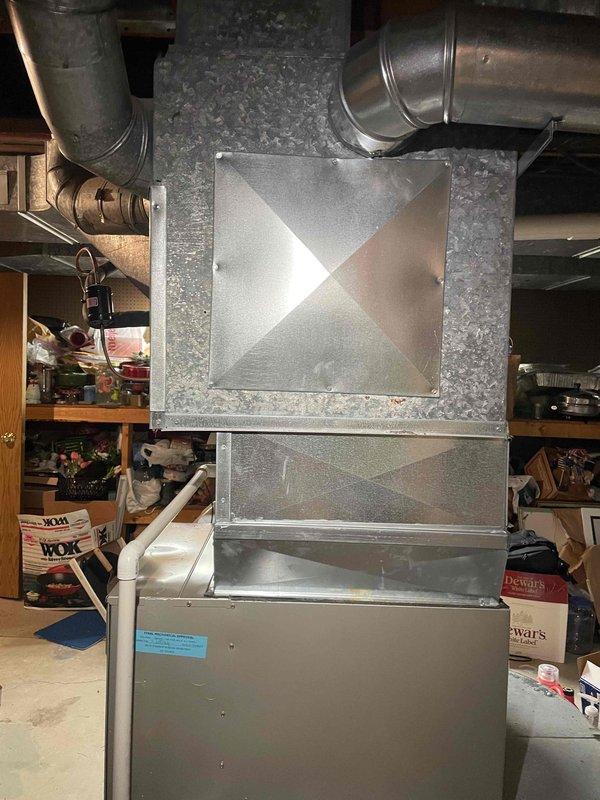 Conducted estimate for replacement of 15-year-old air conditioning system located in basement that is currently experiencing refrigerant leak and not operating efficiently. Assessed existing HVAC equipment configuration including air handler unit and ductwork distribution system, taking measurements of interior dimensions and documenting current installation setup. Provided homeowner with replacement options for complete A/C system to restore proper cooling capacity and eliminate refrigerant leak issue.