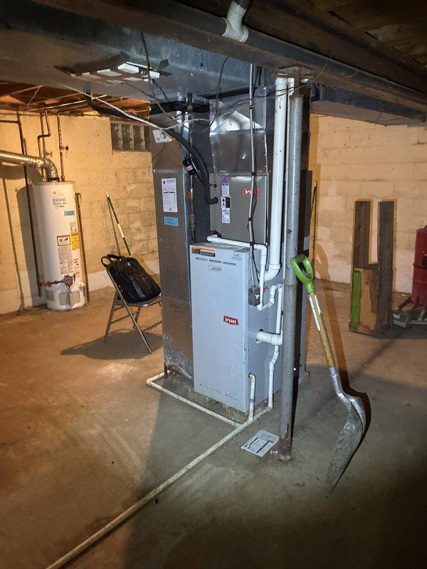 Provided estimate for replacement of 25+ year old Bryant natural gas furnace and air conditioning system located in basement. Current equipment operational but at end of service life. Recommended full HVAC system replacement under buy-one-get-one promotion, including new furnace, AC unit, and associated ductwork modifications as needed for proper installation and airflow.