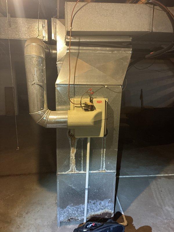 Provided estimate for replacement of 25+ year old Bryant natural gas furnace and air conditioning system located in basement. Current equipment operational but at end of service life. Recommended full HVAC system replacement under buy-one-get-one promotion, including new furnace, AC unit, and associated ductwork modifications as needed for proper installation and airflow.