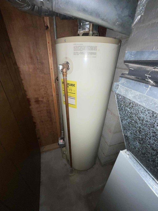 Responded to customer request for furnace replacement estimate due to squeaky noise from 28-year-old unit located in basement. Assessed existing heating system and surrounding utility area, documenting equipment condition and installation space constraints. Provided comprehensive replacement options and recommendations based on equipment age, current performance issues, and absence of existing warranty coverage.