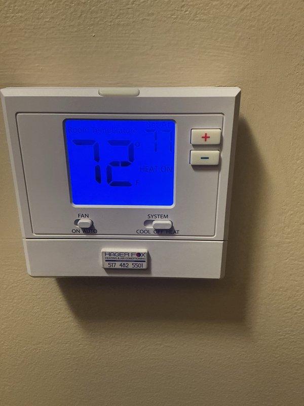 Completed annual heating maintenance on residential HVAC system. Inspected and replaced heavily soiled air filter showing significant dust accumulation. Verified thermostat operation and temperature settings at 72°F with system controls functioning properly in all modes (heat, cool, auto).