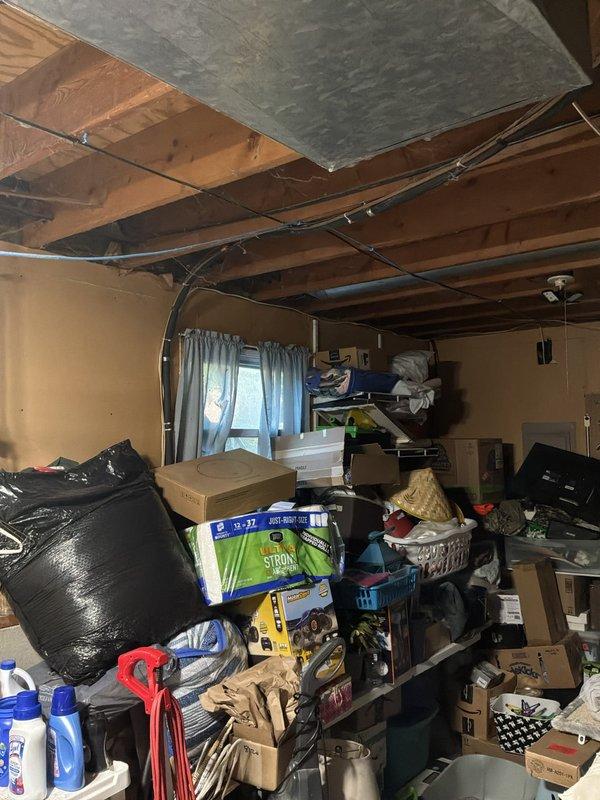 Conducted comprehensive full system estimate for replacement of 16-year-old furnace and air conditioning system in residential property. Inspected existing HVAC equipment located in basement utility area, including aging furnace with beige metal housing and associated ductwork showing signs of wear. Evaluated galvanized metal ductwork, copper piping with visible oxidation, and overall system configuration to determine replacement requirements. Documented equipment condition through photographs and provided recommendations for complete furnace and air conditioner replacement to address immediate customer need for system upgrade.